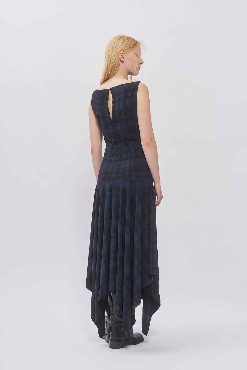 Back view of Taus Asymmetrical Dress in navy and black check with keyhole opening and pointed hem