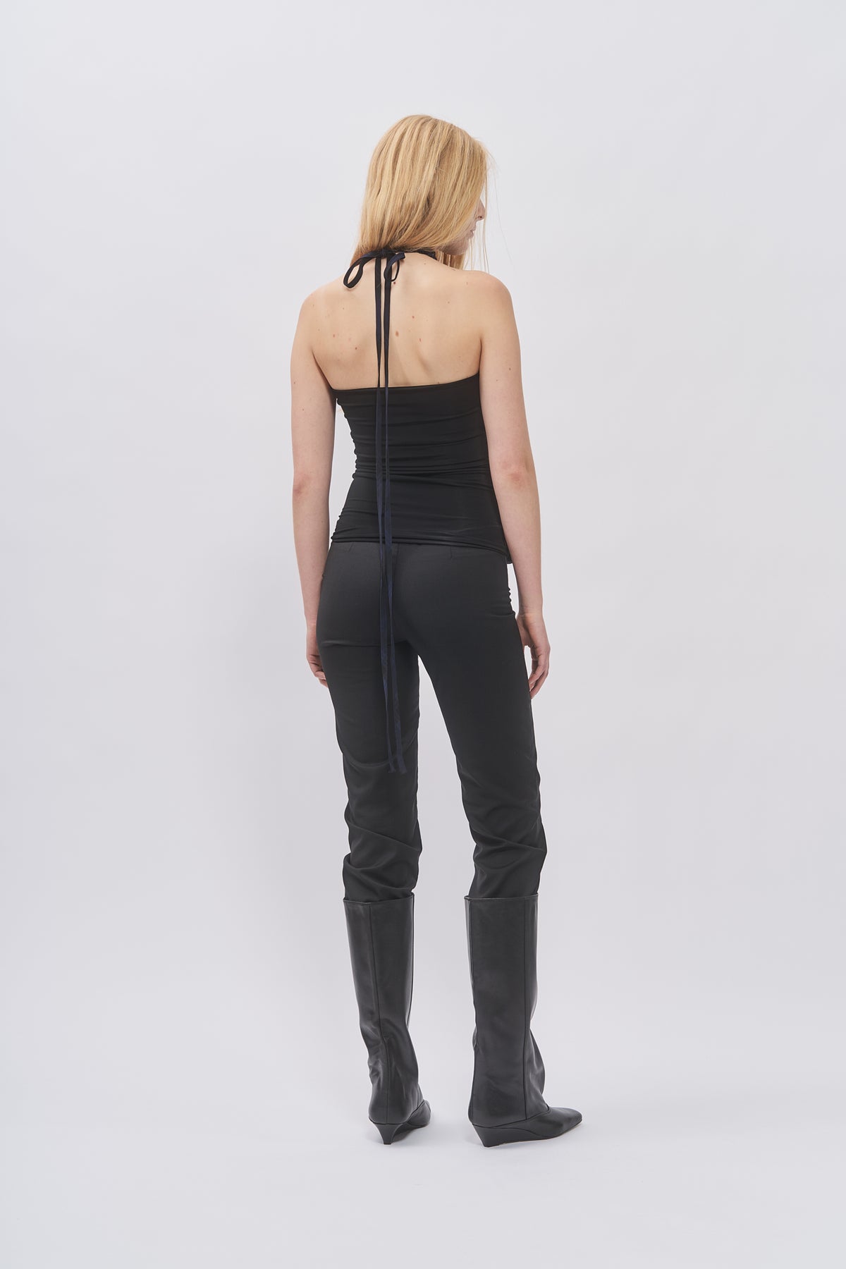 Back view of Taus Two-Layer Halterneck Top showing the tie-neck halter straps and open back