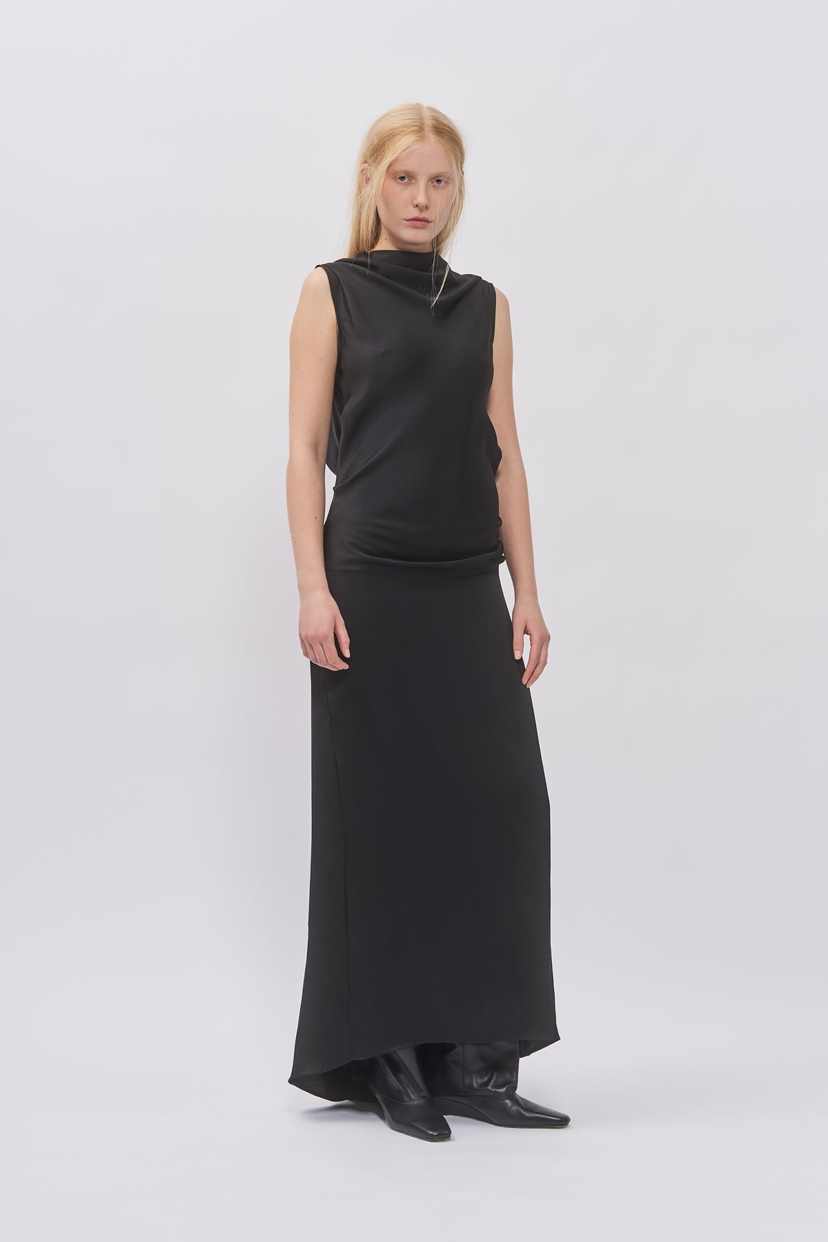 Taus Open-Back Dress in black, sleeveless maxi dress with draped high neckline, front view
