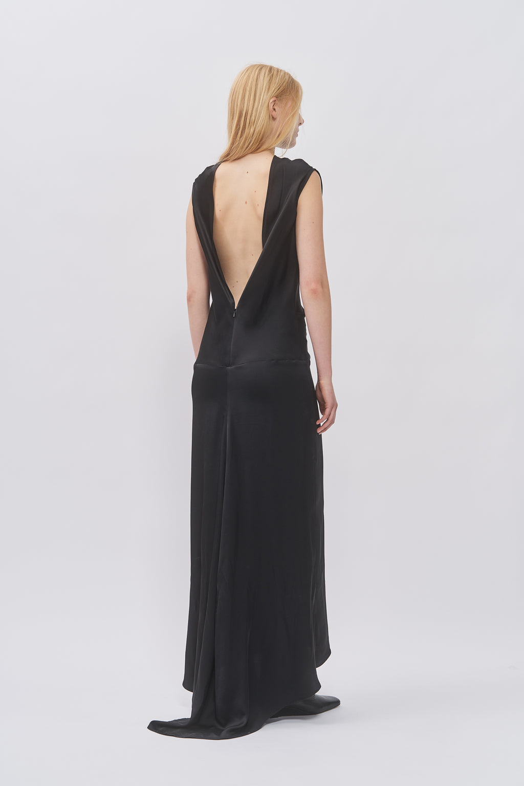 Back view of Taus Open-Back Dress in black with deep V open back and floor-length hem
