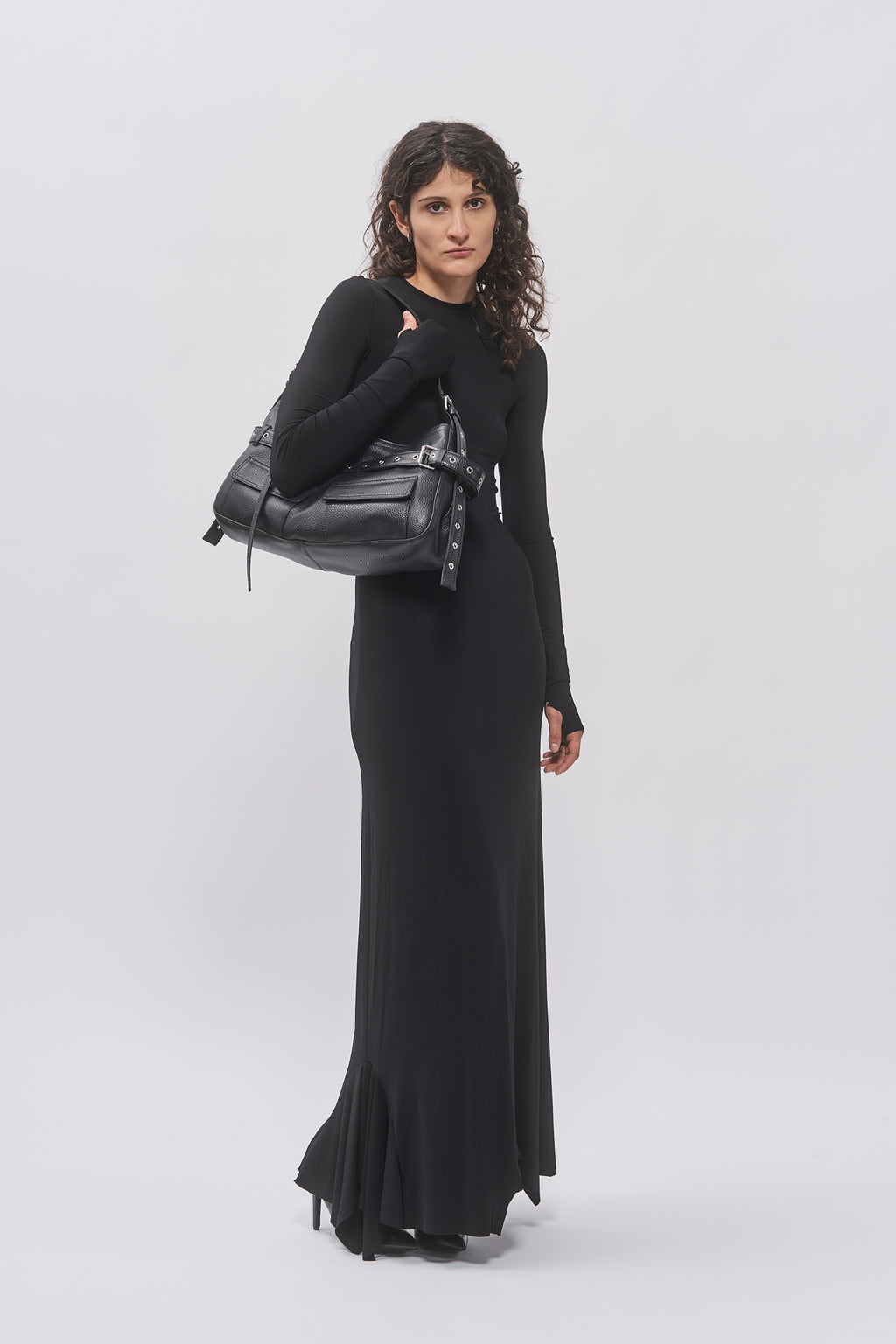 Taus T-Shirt Hem Dress in black, fitted long-sleeve maxi dress, styled with the black leather Juho Bag