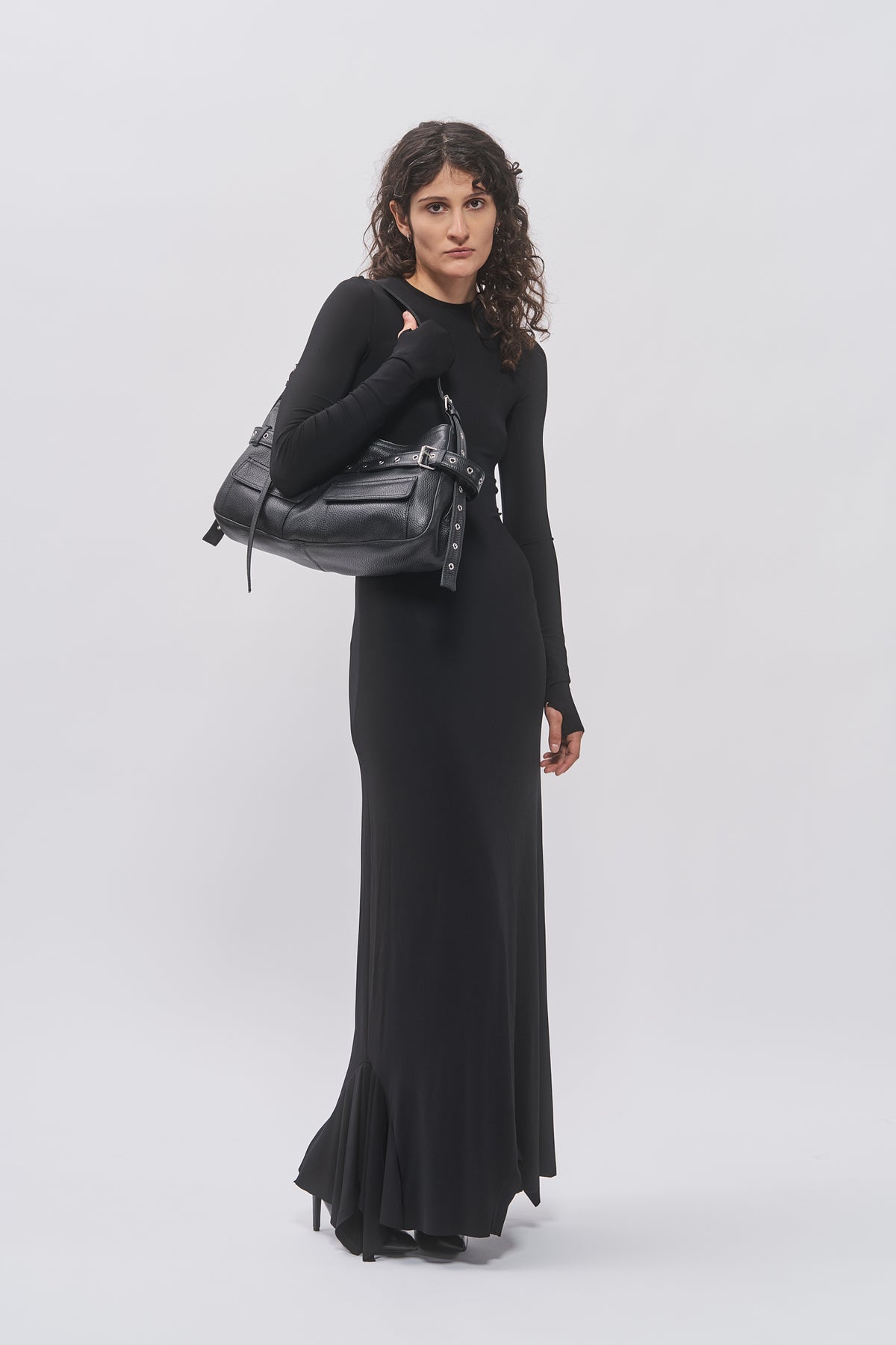Taus T-Shirt Hem Dress in black, fitted long-sleeve maxi dress, styled with the black leather Juho Bag