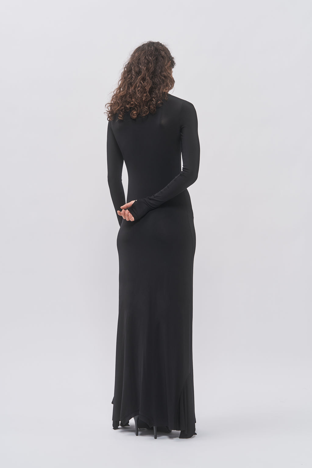 Back view of Taus T-Shirt Hem Dress in black, long-sleeve fitted maxi dress
