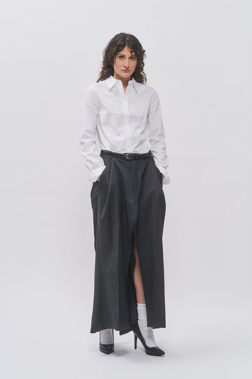 Taus Upcycled Suit Skirt in charcoal grey, maxi skirt with front slit, styled with a white shirt and belt