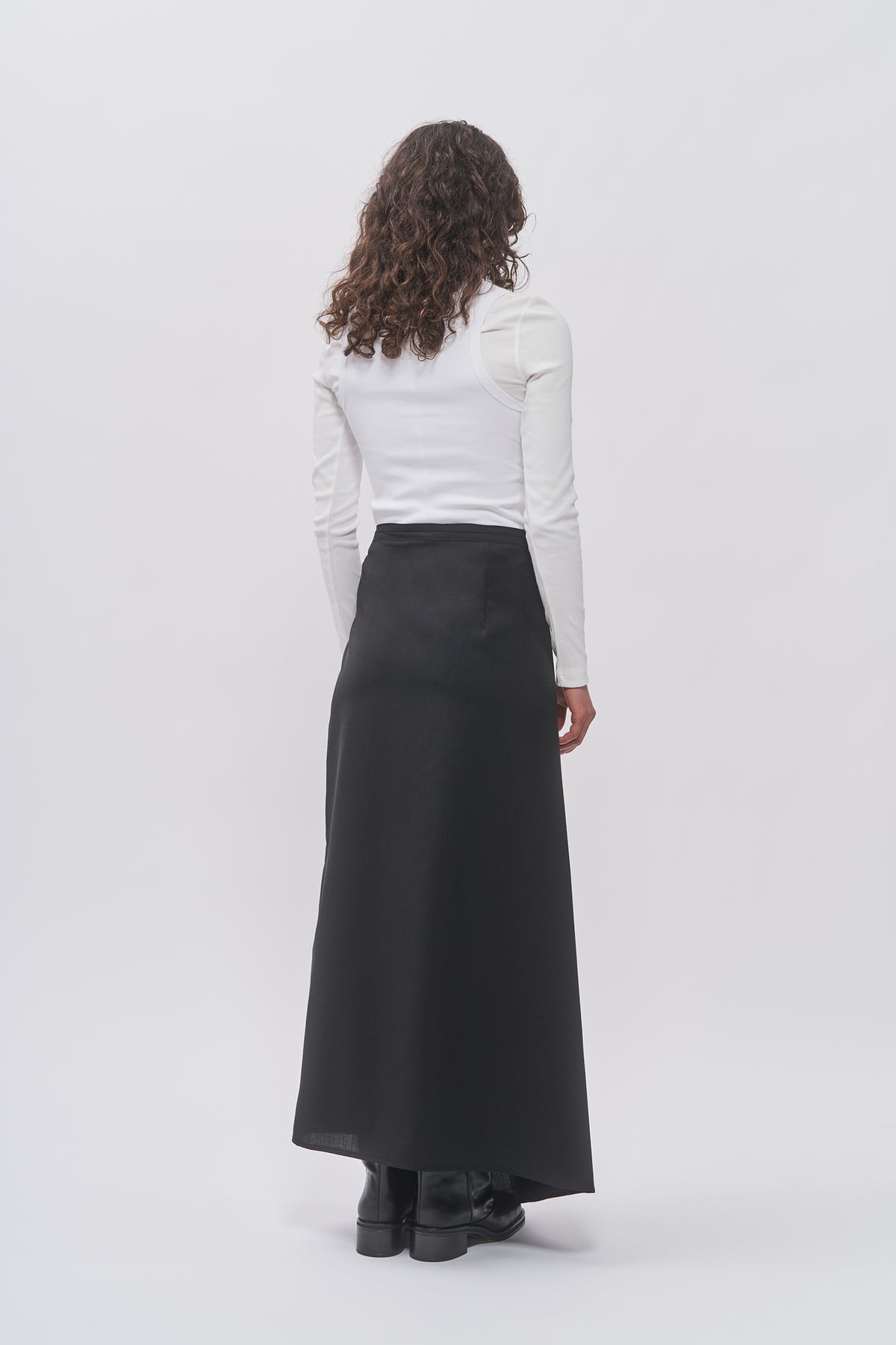 Back view of Taus Wrap Skirt in black, A-line maxi length