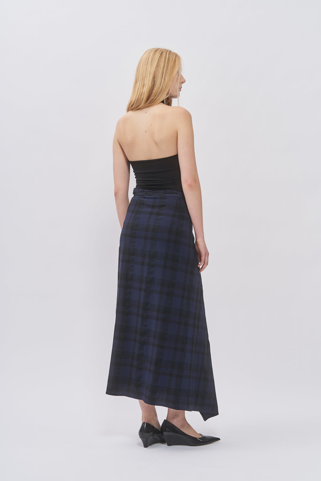 Back view of Taus Wrap Skirt in navy and black check, maxi length